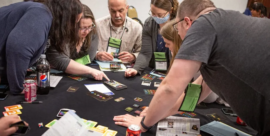 People playing board games